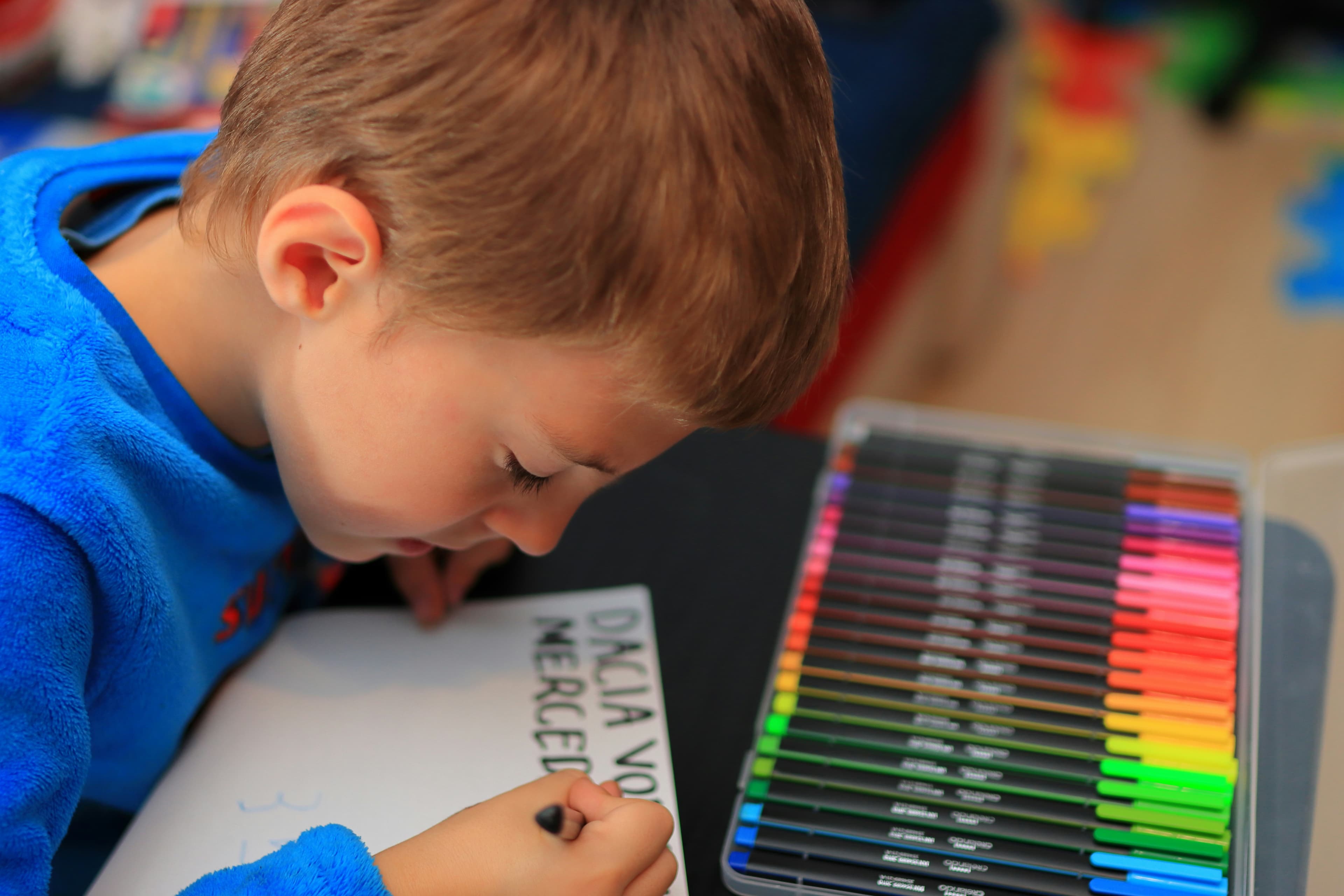 Kids coloring their family memories