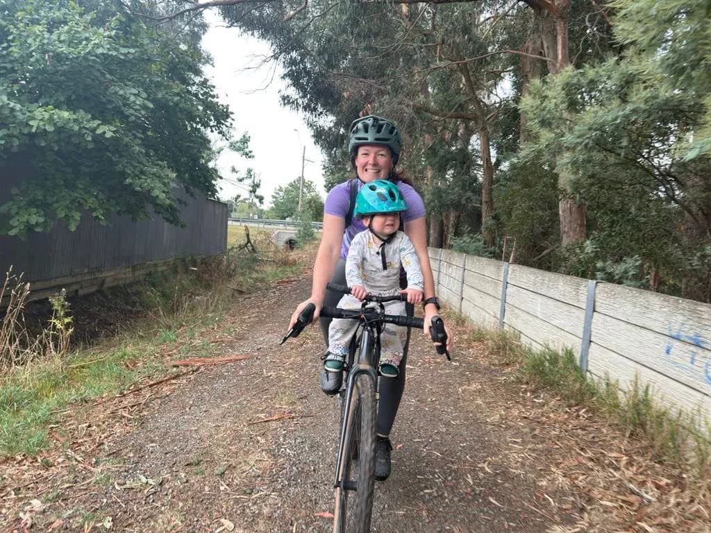 Child enjoying a Koluwin colouring page